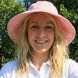 Review pic: woman wearing UV protection sun hat outdoors