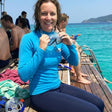 Review pic: woman wearing sun protection swim tights whilst on a snorkelling trip 