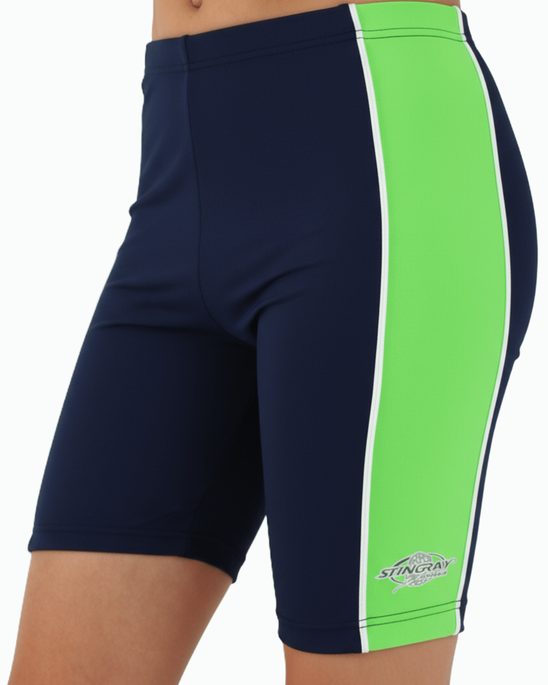 Toddler wearing navy upf 50+ swim shorts with a green stripe and a Stingray logo on a white background