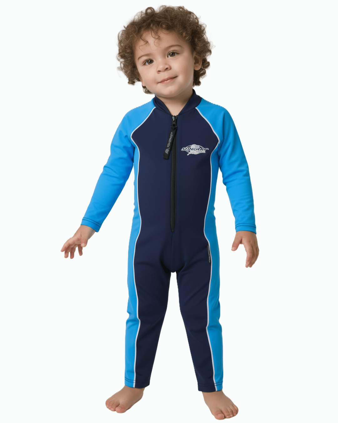 Toddler wearing an azure and navy full body UV protection suit on a white background