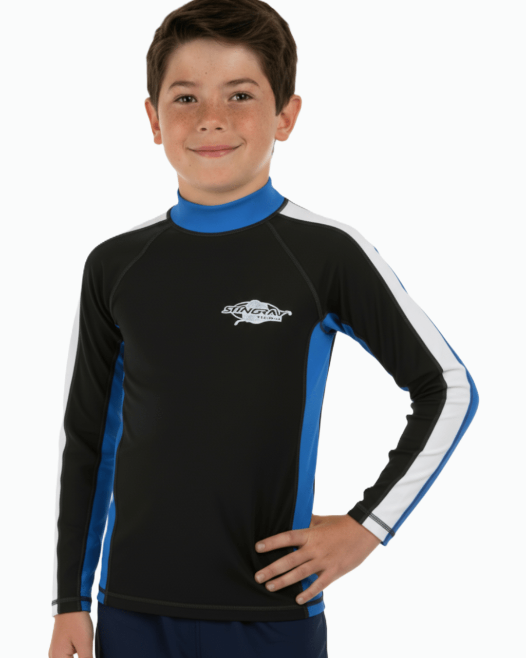 Boy wearing a black long-sleeve UV swim shirt with blue and white accents on a white background