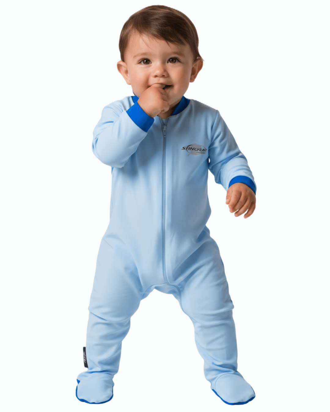 Baby wearing a light blue all in one uv romper with blue cuffs and feet on a white background