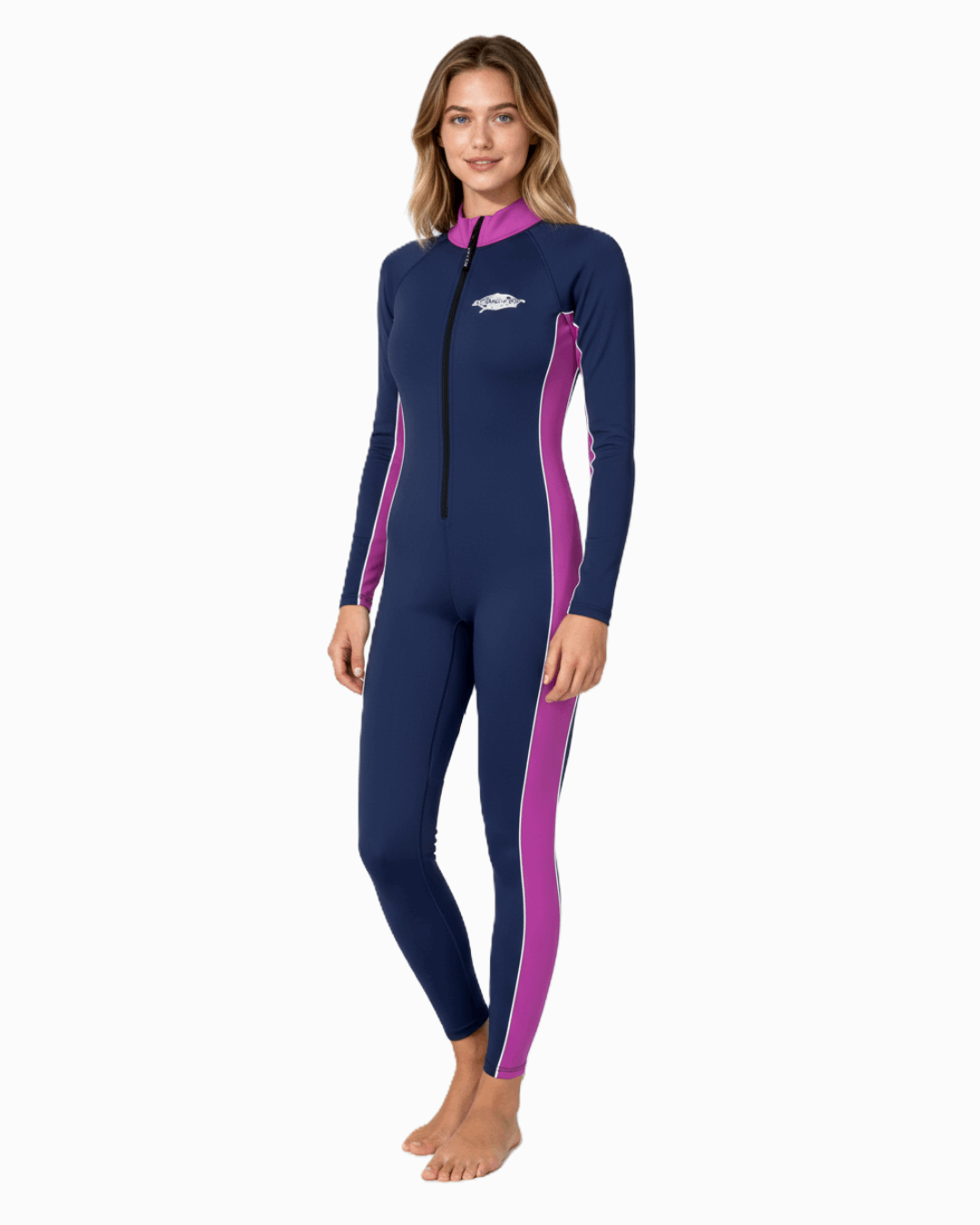 Woman wearing a navy and purple UPF 50+ sunsuit on a white background