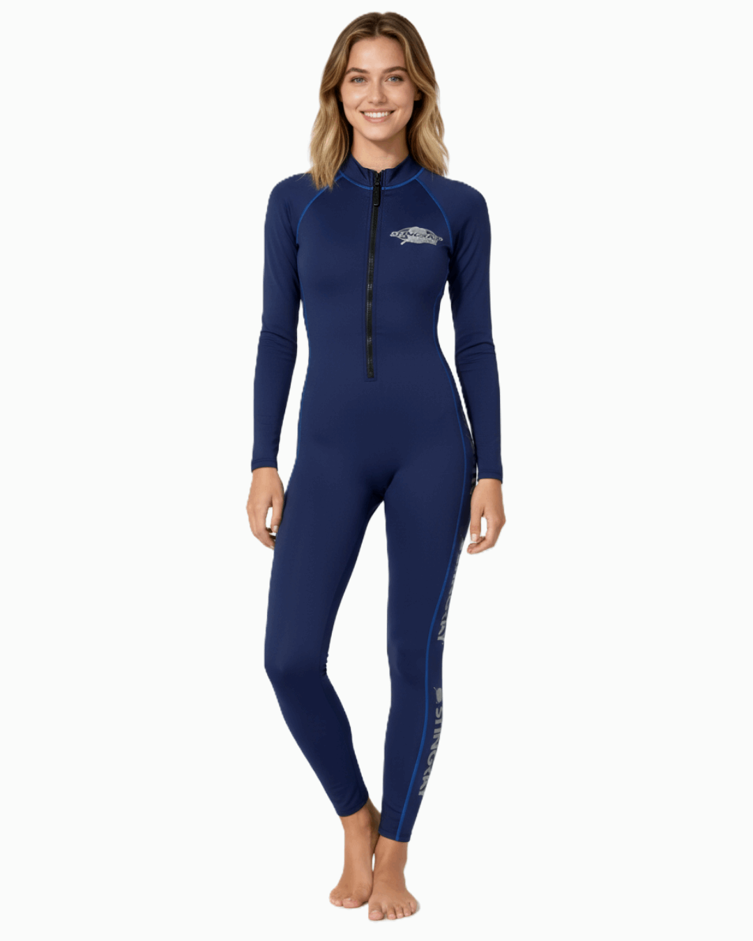 Woman wearing a navy UPF 50+ sunsuit on a white background