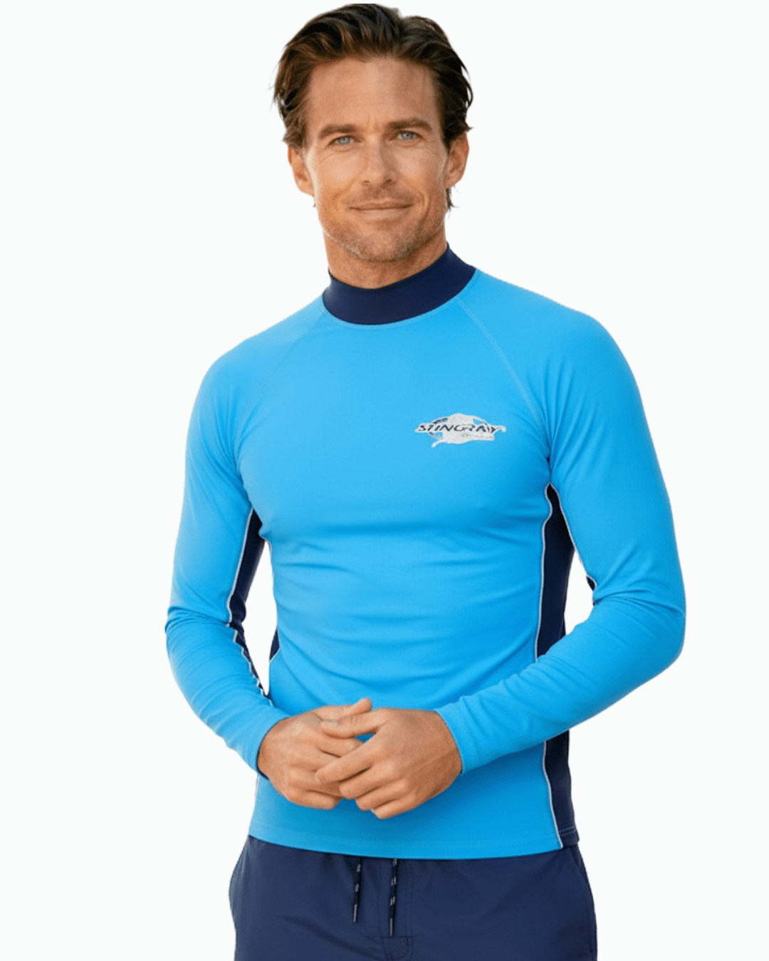 Man wearing Stingray azure and navy unisex long sleeve rash shirt with UPF 50+ sun protection.