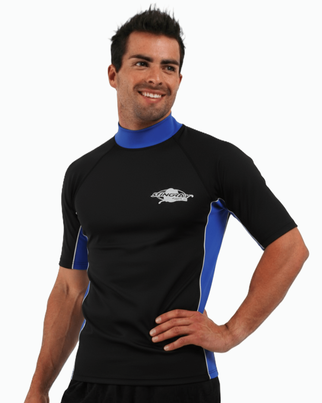 Man wearing black and blue Stingray adult short sleeve rash shirt with UPF 50+ sun protection, made from chlorine-resistant fabric for outdoor and water activities.
