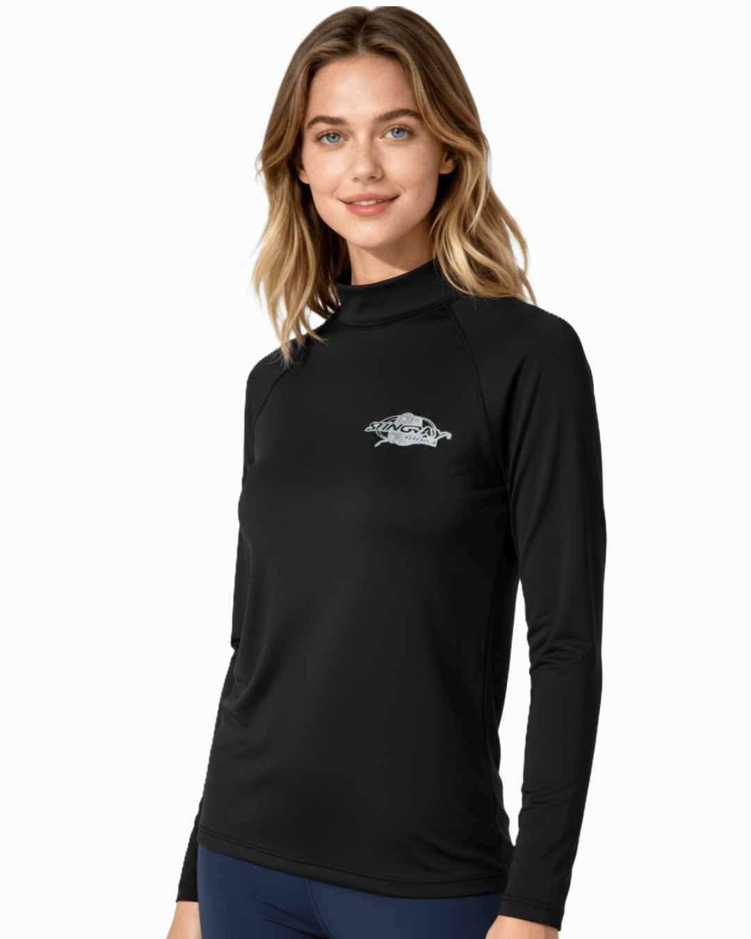 Woman wearing Stingray black unisex long sleeve rash shirt with UPF 50+ sun protection.