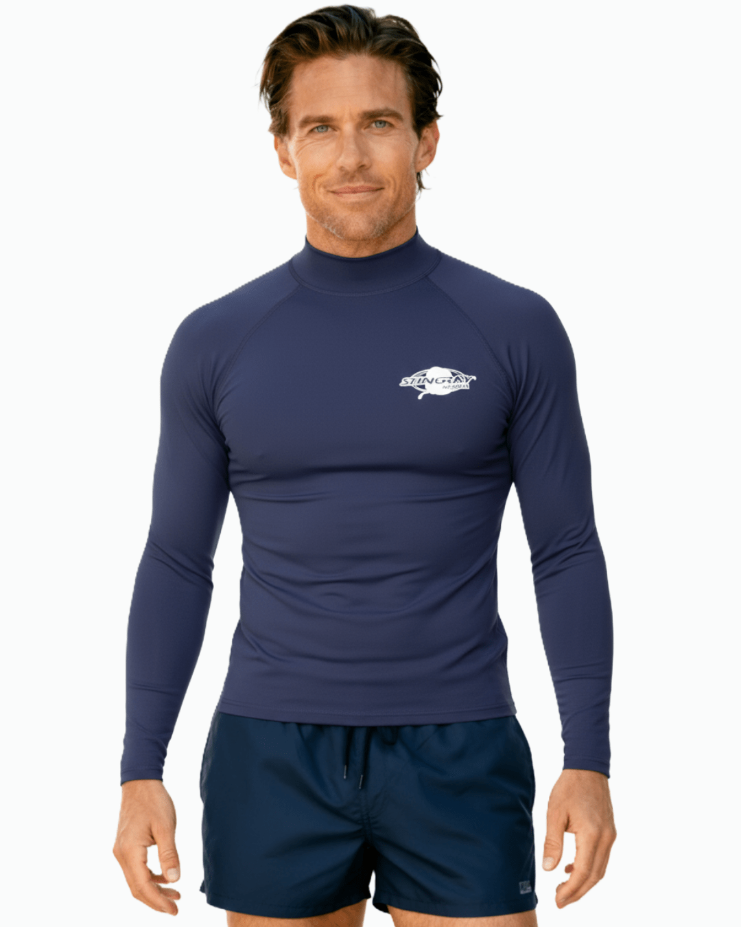 Man wearing Stingray navy unisex long sleeve rash shirt with UPF 50+ sun protection.