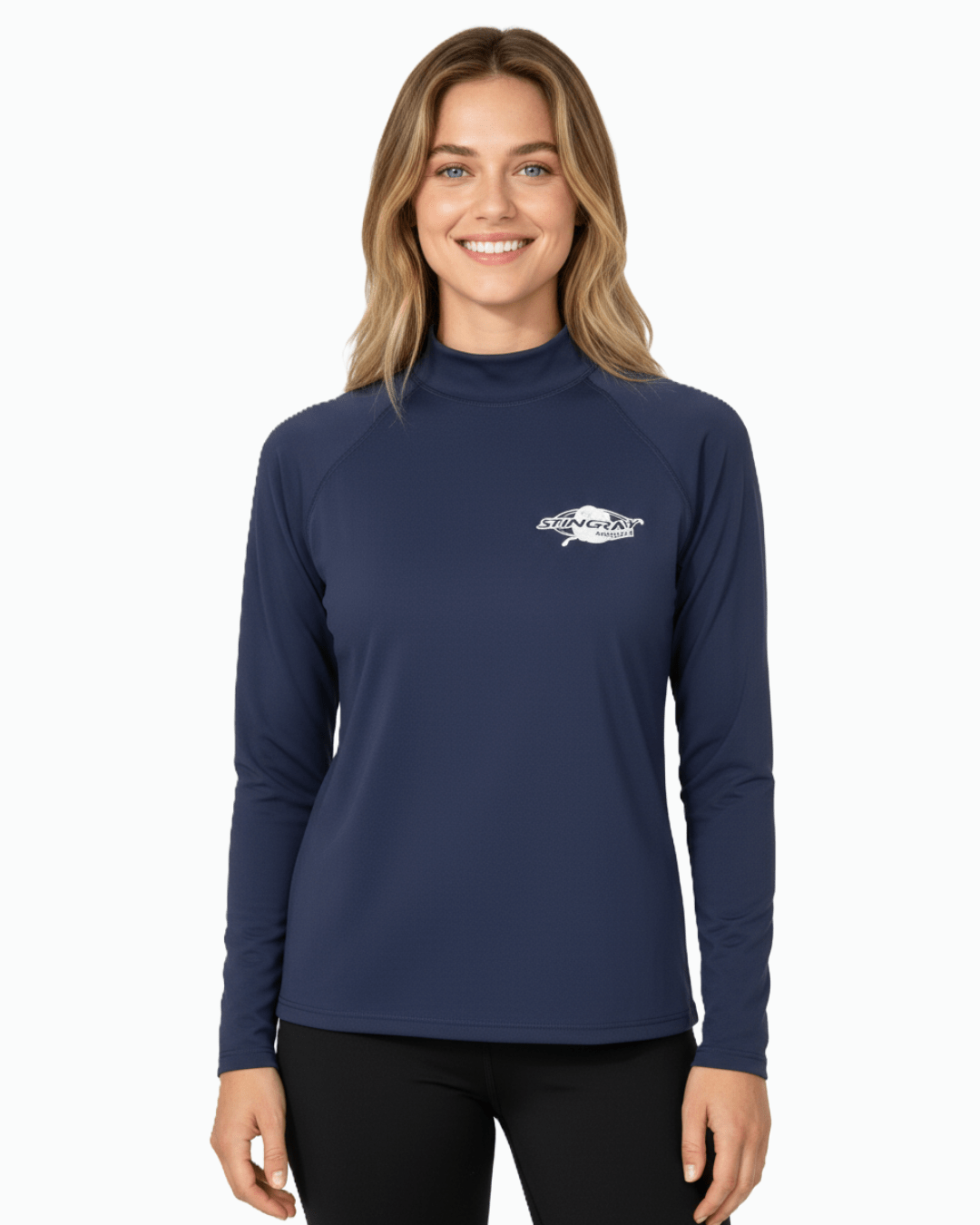 Woman wearing Stingray navy unisex long sleeve rash shirt with UPF 50+ sun protection.