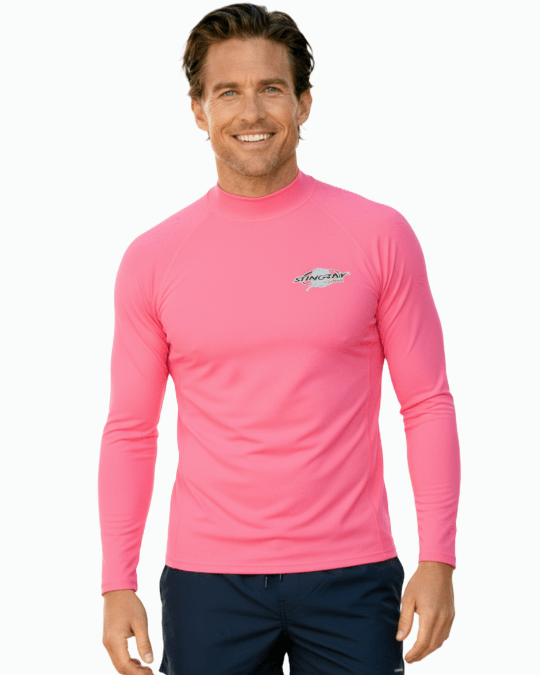 Man wearing Stingray pink unisex long sleeve rash shirt with UPF 50+ sun protection.