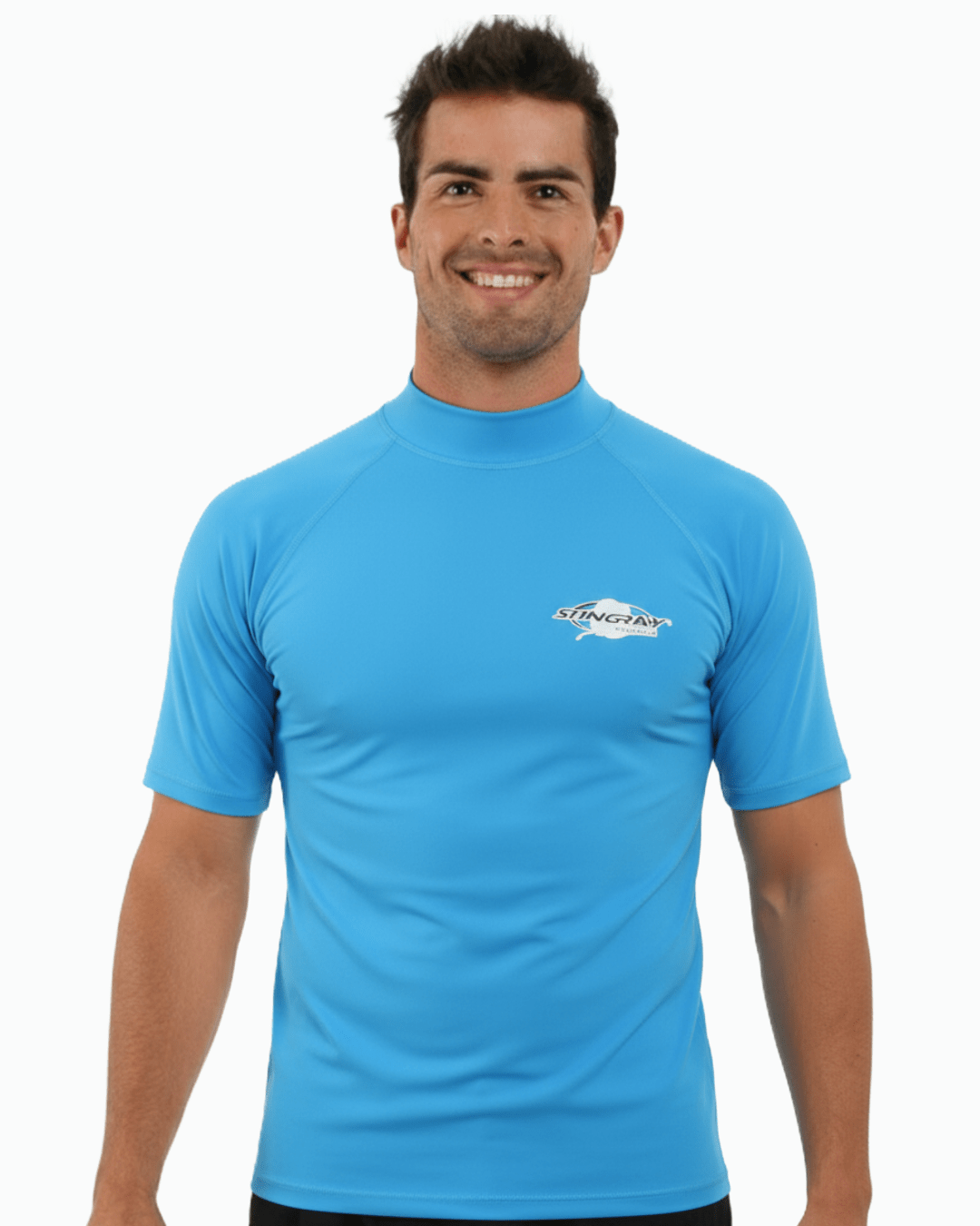 Man wearing azure Stingray adult short sleeve rash shirt with UPF 50+ sun protection, made from chlorine-resistant fabric for outdoor and water activities.