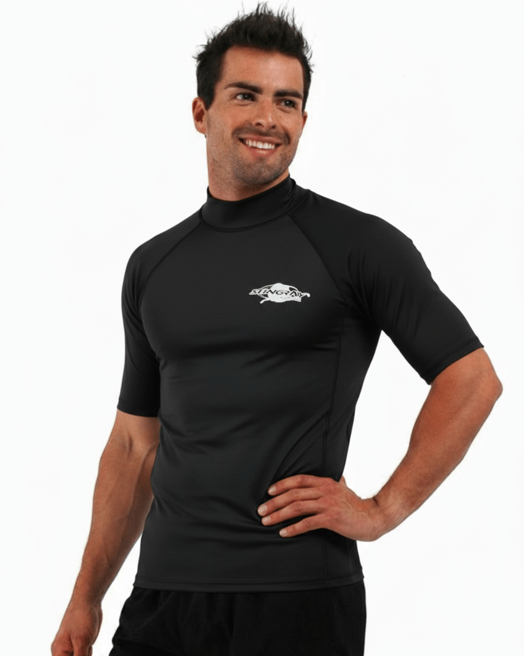 Man wearing black Stingray adult short sleeve rash shirt with UPF 50+ sun protection, made from chlorine-resistant fabric for outdoor and water activities.