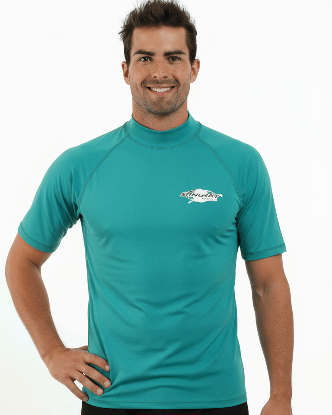 Man wearing topaz Stingray adult short sleeve rash shirt with UPF 50+ sun protection, made from chlorine-resistant fabric for outdoor and water activities.