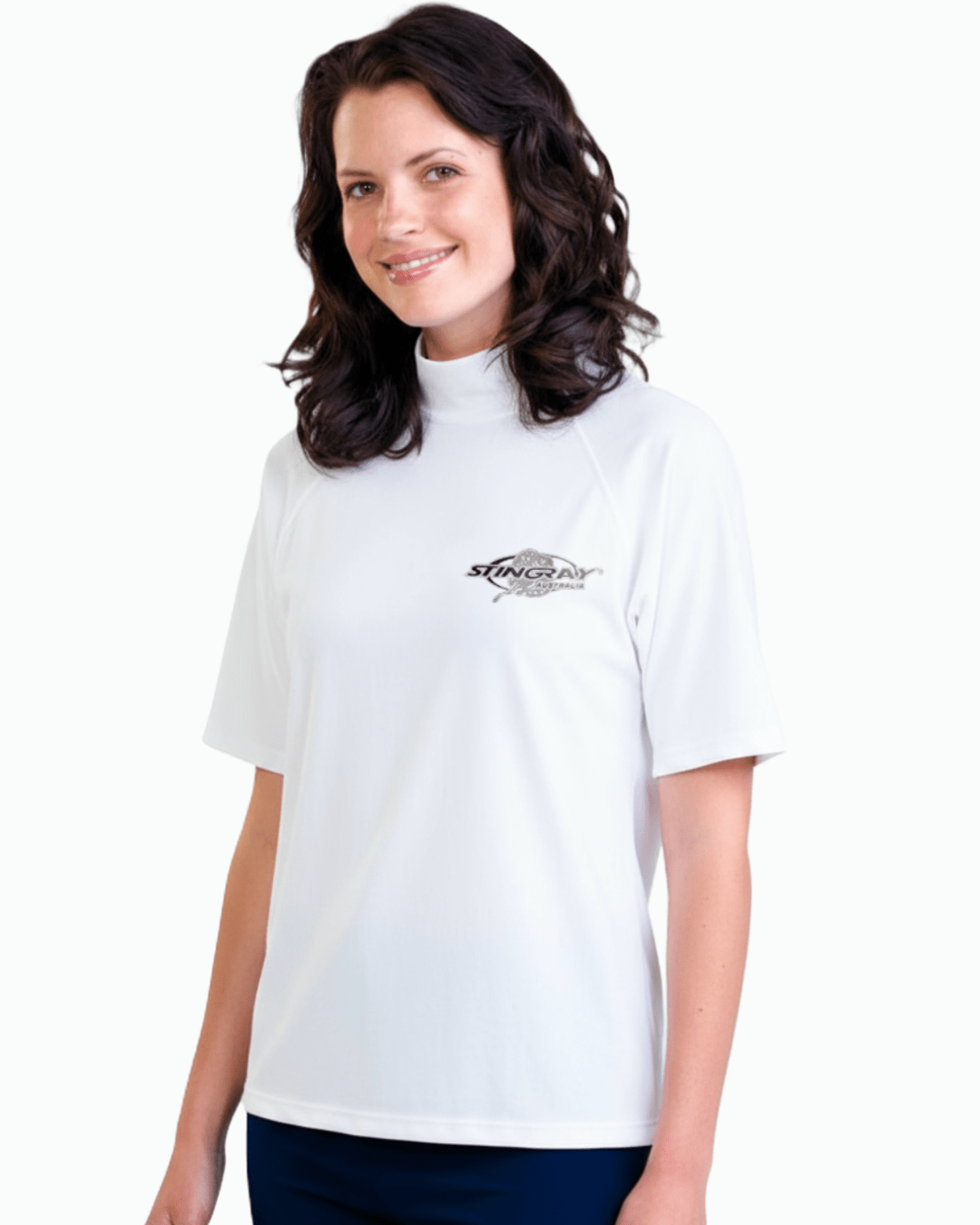 Woman wearing white Stingray adult short sleeve rash shirt with UPF 50+ sun protection, made from chlorine-resistant fabric for outdoor and water activities.