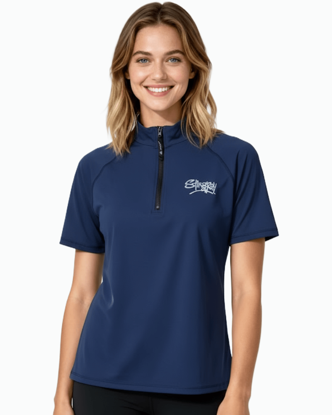 Woman wearing navy Stingray unisex adult short sleeve quarter zip rash shirt with UPF 50+ sun protection.