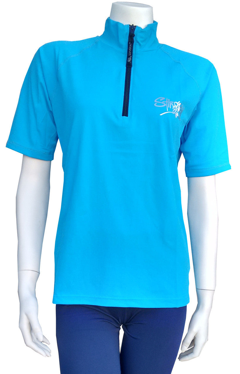 Azure Stingray unisex adult short sleeve quarter zip rash shirt with UPF 50+ sun protection, high collar, and durable chlorine-resistant Italian fabric.