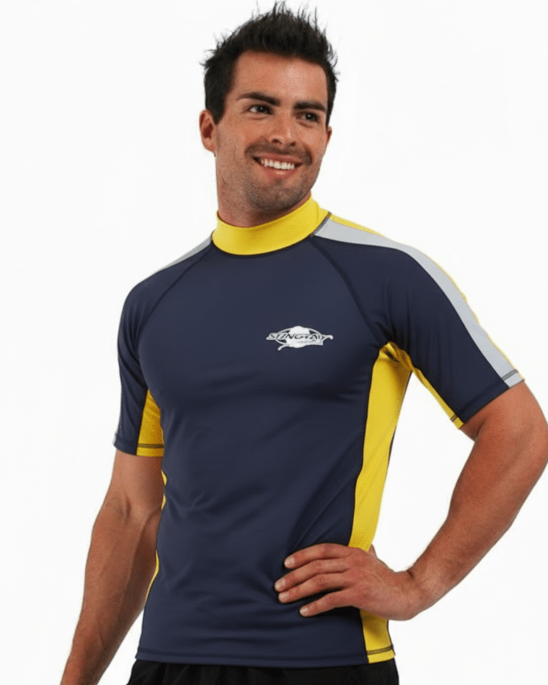 Man wearing navy, white and yellow Stingray adult short sleeve rash shirt with UPF 50+ sun protection, made from chlorine-resistant fabric for outdoor and water activities.