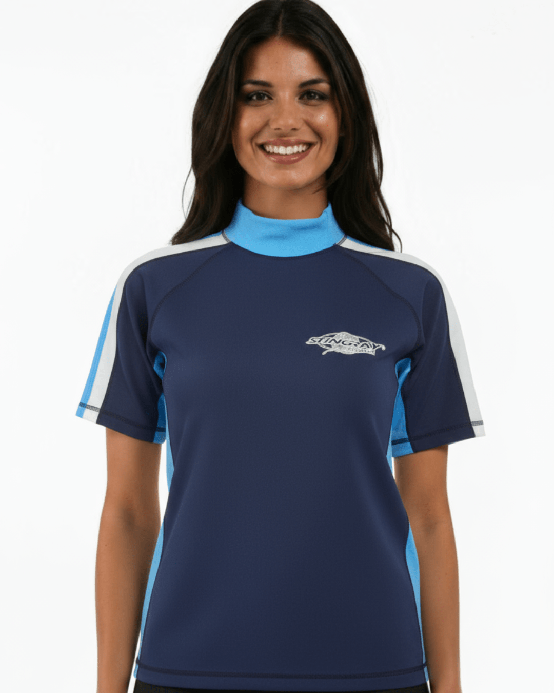 Woman wearing navy, white and azure Stingray adult short sleeve rash shirt with UPF 50+ sun protection, made from chlorine-resistant fabric for outdoor and water activities.