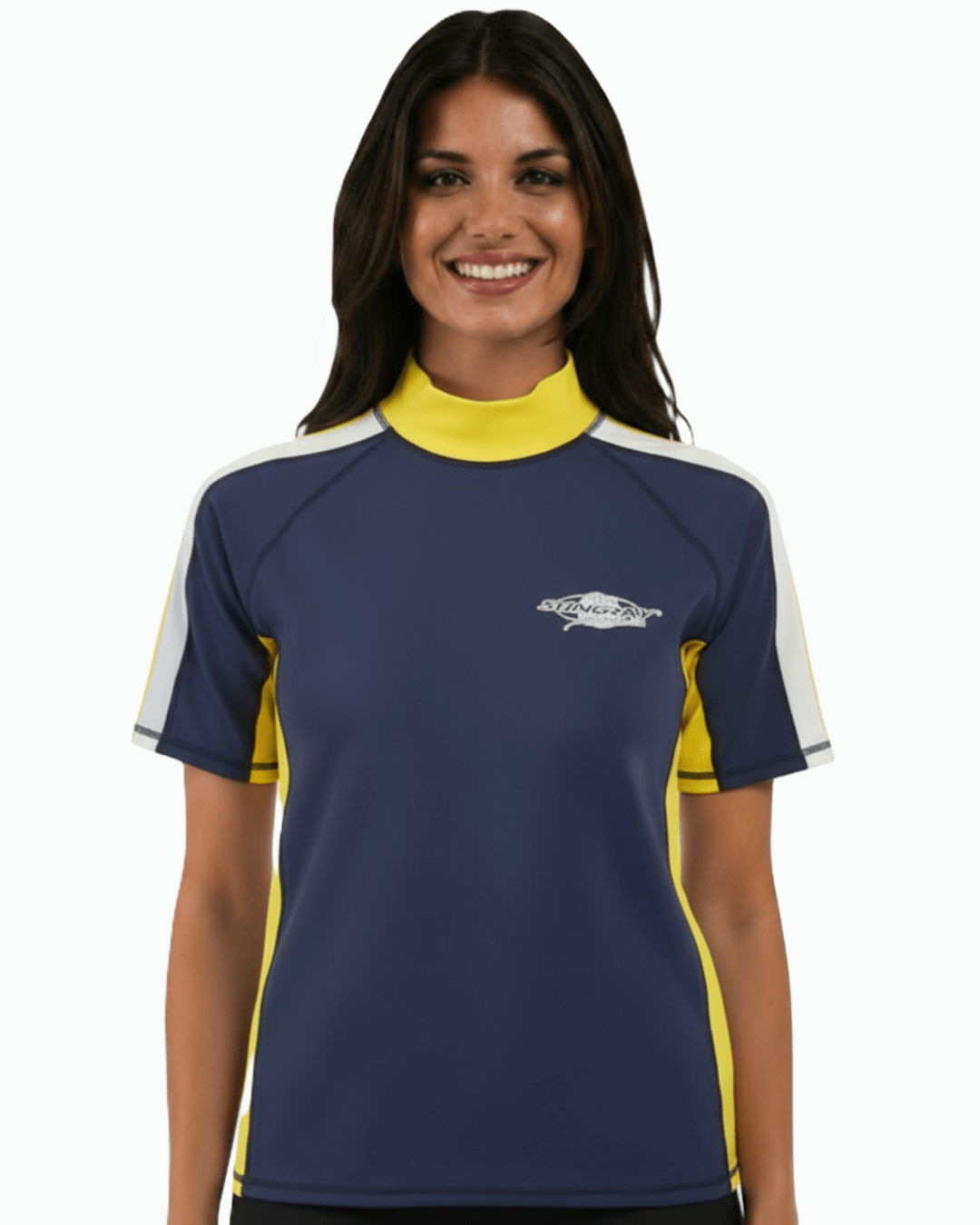 Woman wearing navy, white and yellow Stingray adult short sleeve rash shirt with UPF 50+ sun protection, made from chlorine-resistant fabric for outdoor and water activities.