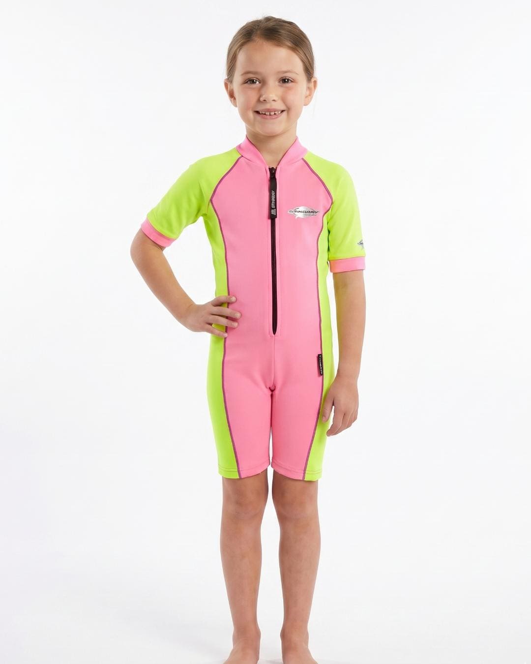 Girl wearing a short sleeve uv swimsuit in pink and yellow
