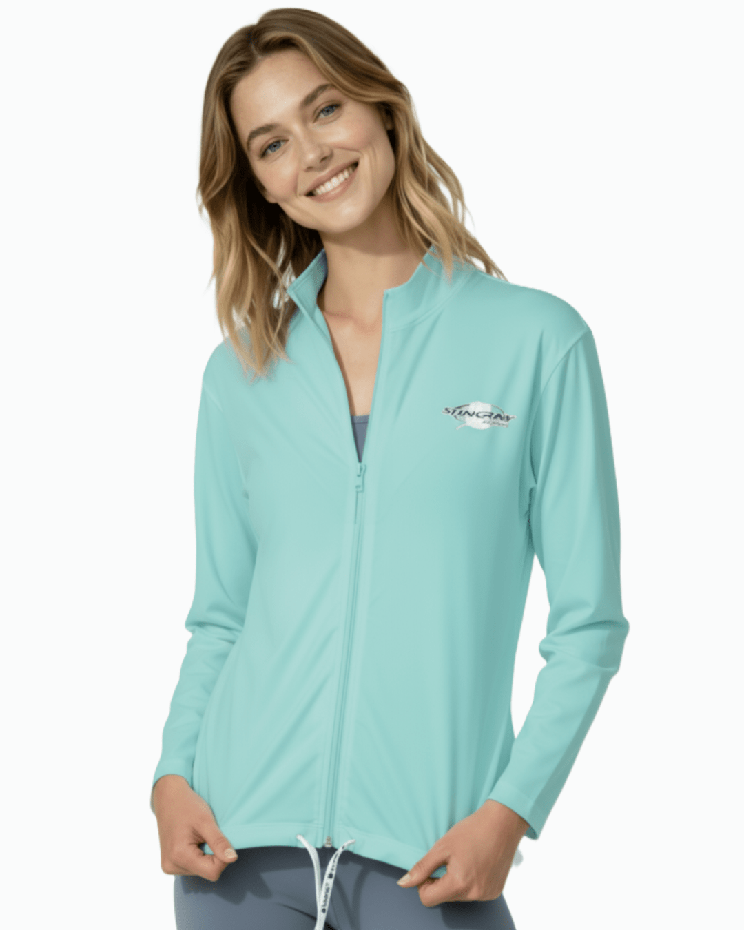 Woman wearing the aqua sun safe long sleeve jacket, made from UPF 50+ fabric