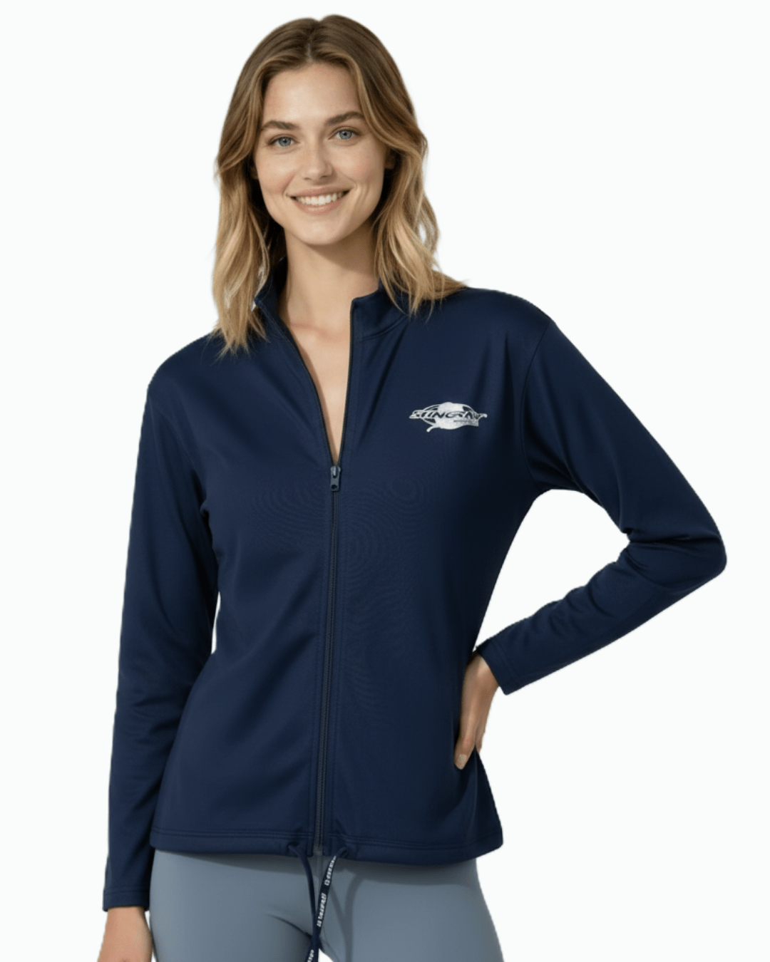Woman wearing the navy sun safe long sleeve jacket, made from UPF 50+ fabric