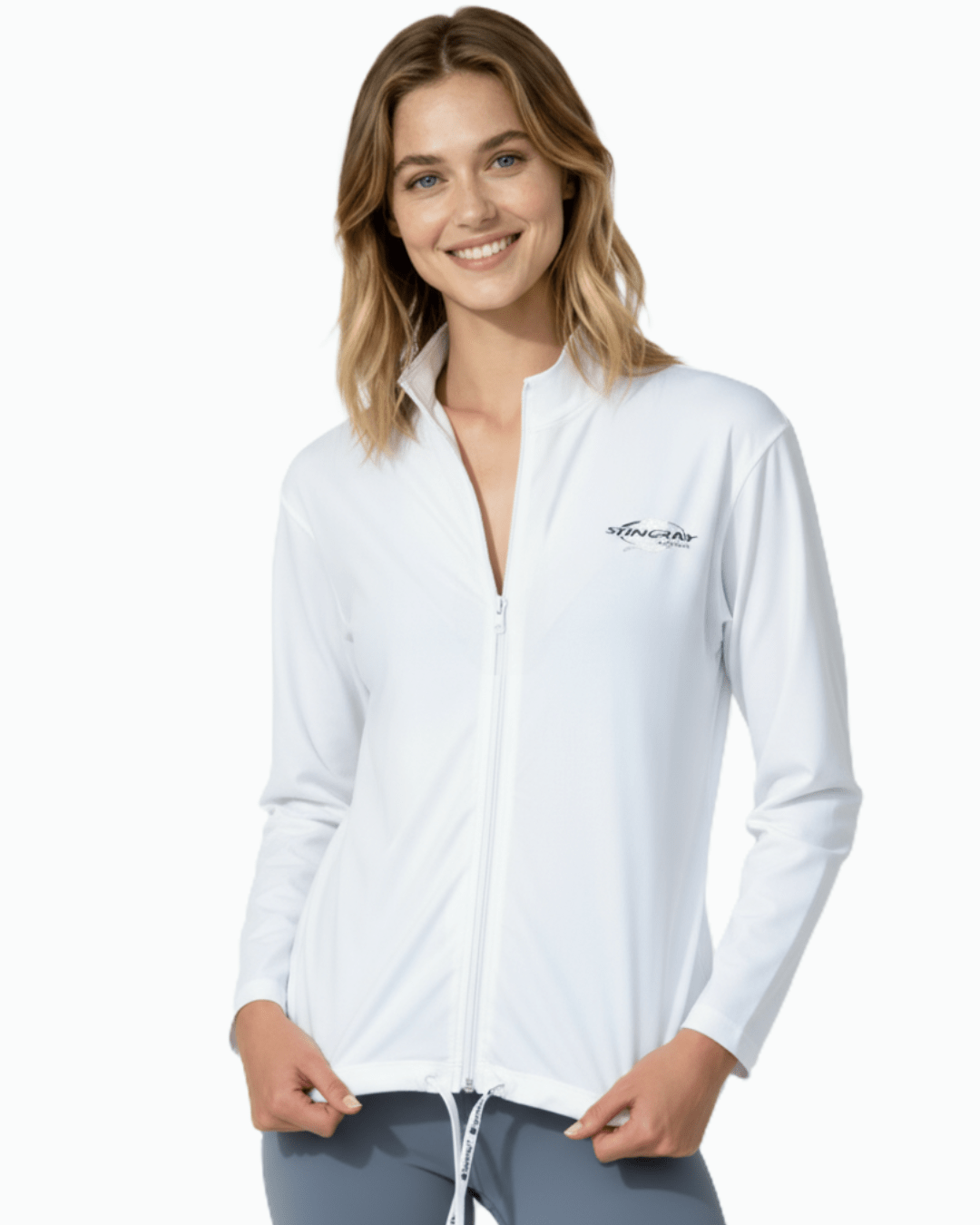 Woman wearing the white sun safe long sleeve jacket, made from UPF 50+ fabric