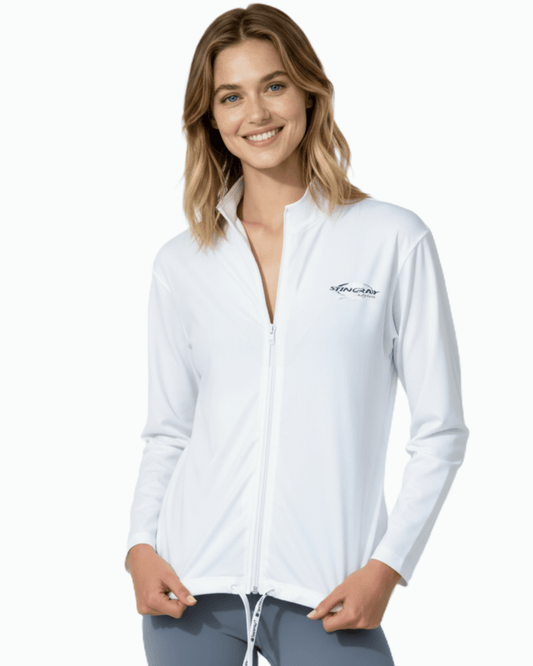 Woman wearing the white sun safe long sleeve jacket, made from UPF 50+ fabric