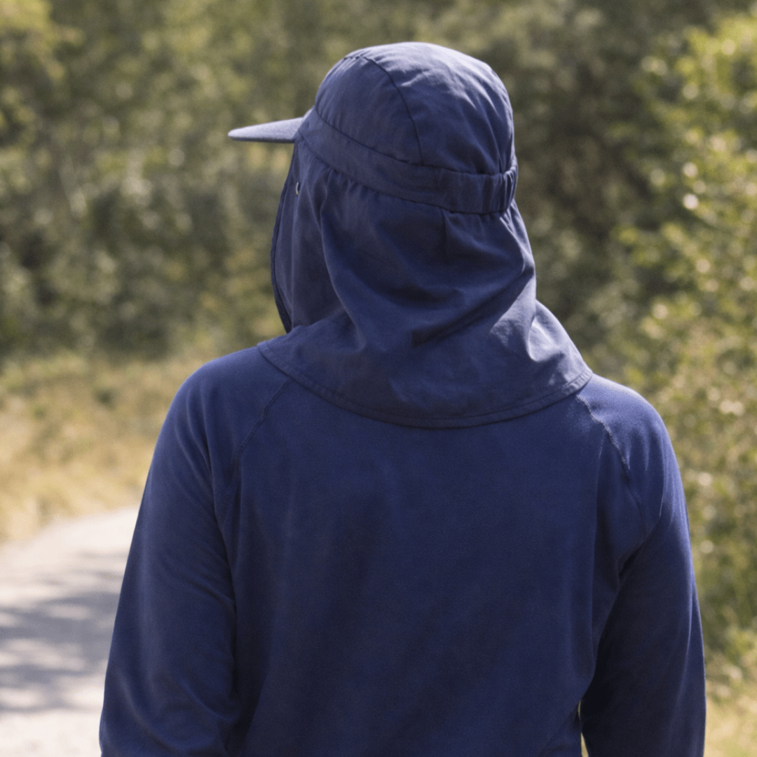 Adult wearing the UPF 50+ nomad sun hat whilst hiking 