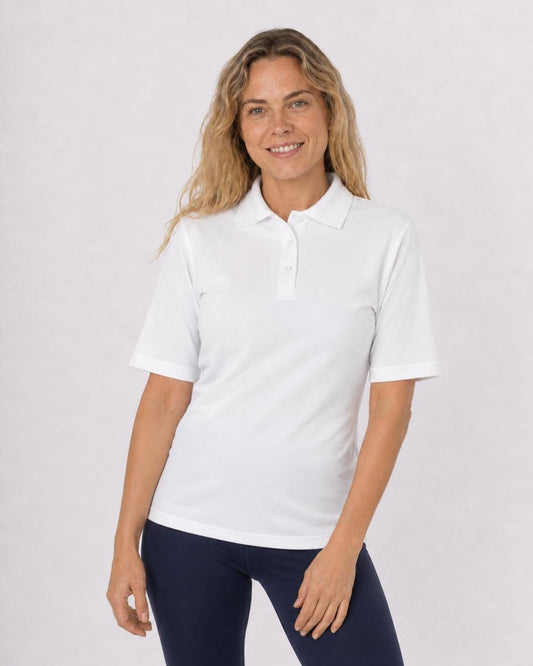 Woman wearing a white short sleeve UV polo shirt and navy leggings on a white background