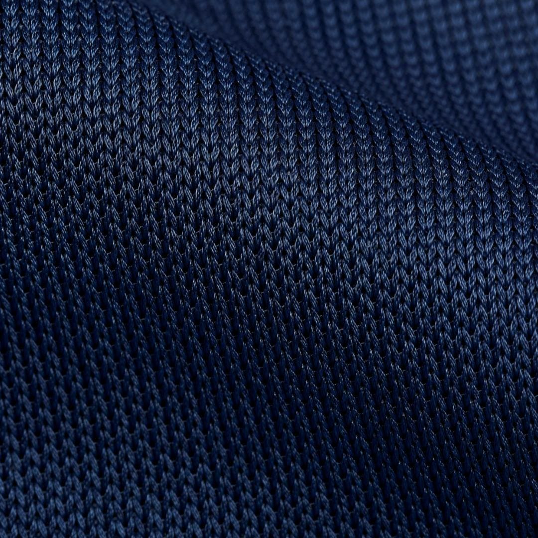 Ultra close-up of mens short sleeve swim shirt UPF 50+ fabric