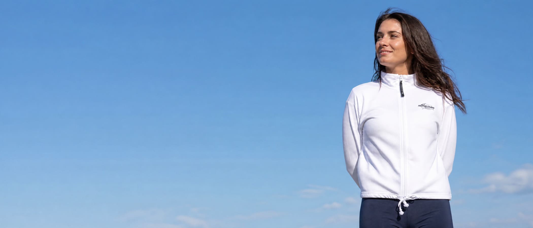 Woman wearing UV jacket UPF50+ in the sun