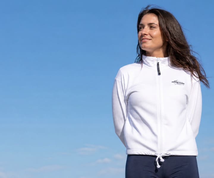 Woman wearing UV jacket UPF50+ in the sun