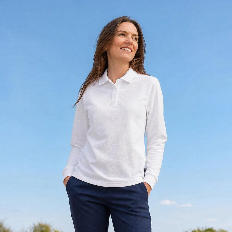 Woman wearing long sleeve UV polo shirt UPF 50+ in the sun