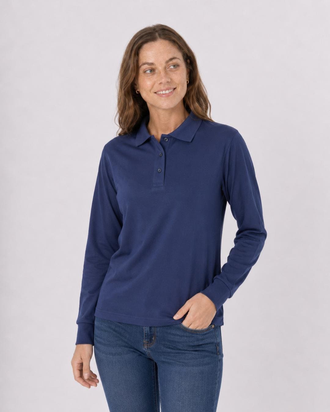 Woman wearing a navy blue long-sleeve UV polo shirt UPF 50+ against a plain background