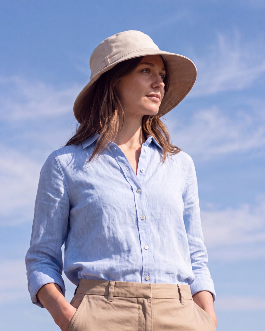 Womens Reversible UV Wide Brim Sun Hat UPF 50+ Desert Sand on inside and Oatmeal on outside Ribbon is Oatmeal - On Model lifestyle V2